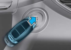 Press the Hyundai i30 engine start/stop button with the smart key